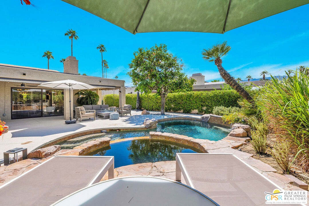 20 Kevin Lee Lane Rancho Mirage, CA 92270 - Photo 29 of 40 a view of a swimming pool with a patio