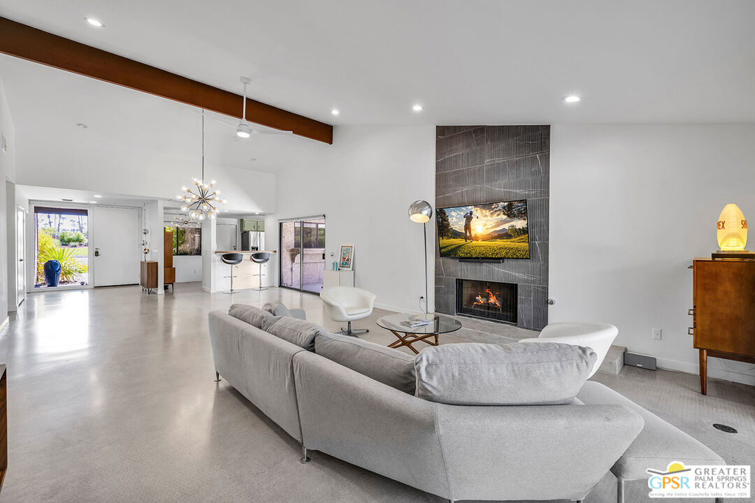 20 Kevin Lee Lane Rancho Mirage, CA 92270 - Photo 9 of 40 a living room with fireplace and a couch