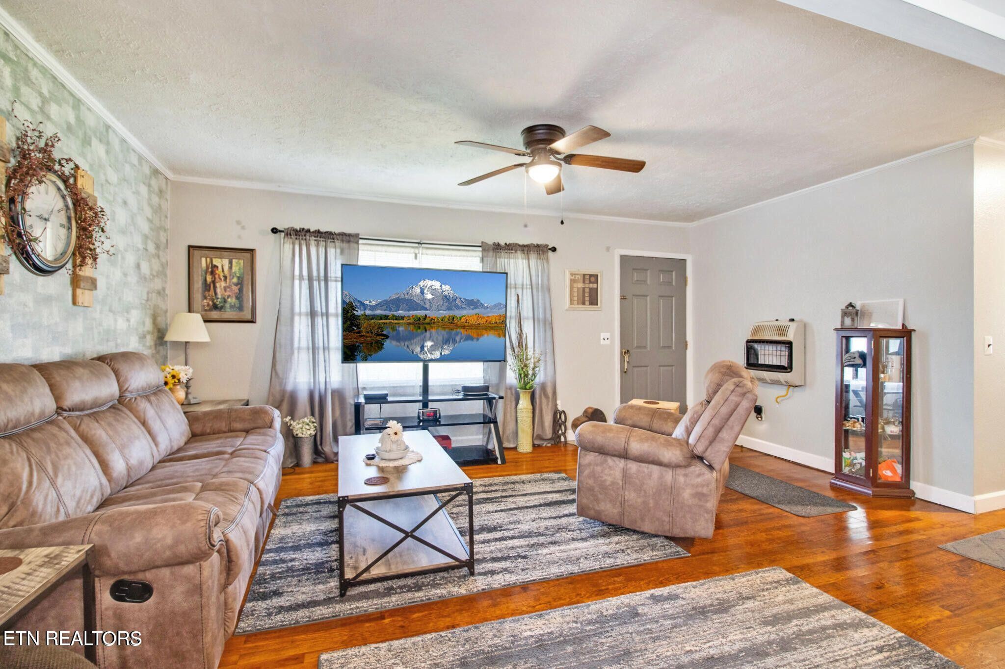 700 Rugby Avenue Jamestown, TN 38556 - Photo 12 of 24 a living room with furniture and wooden floor