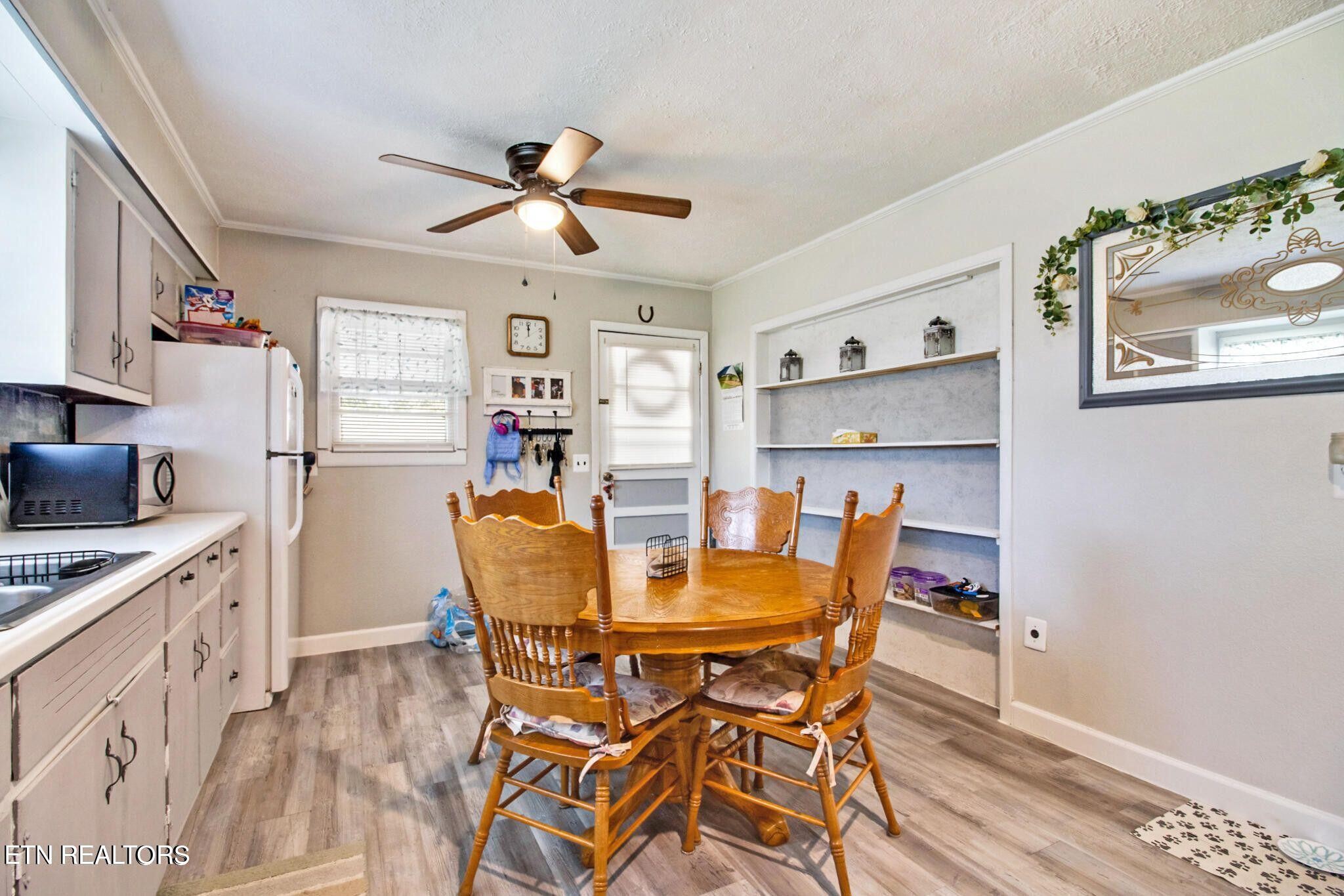 700 Rugby Avenue Jamestown, TN 38556 - Photo 18 of 24 a dining room with furniture and window