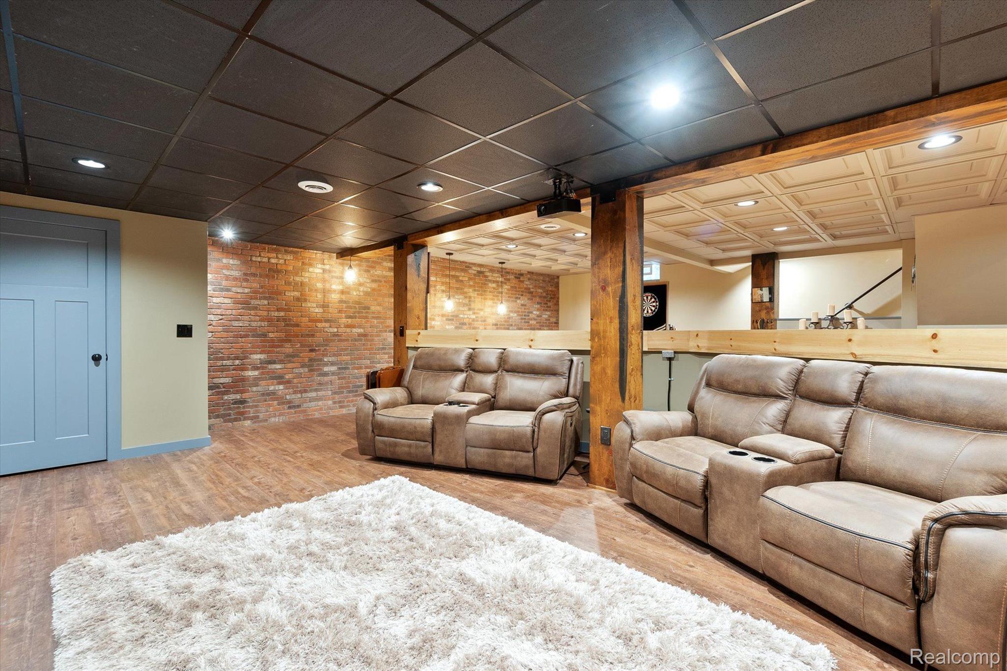 218 Locust Point Howell, MI 48843 - Photo 35 of 59 Theatre Area in Finished Basement