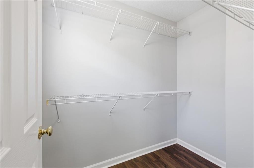 200 Riverstone Commons Circle Canton, GA 30114 - Photo 17 of 28 a view of a room with racks on the wall