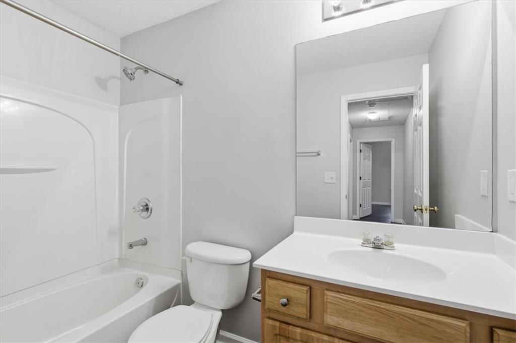 200 Riverstone Commons Circle Canton, GA 30114 - Photo 20 of 28 a bathroom with a sink toilet and shower