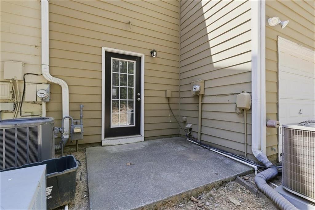 200 Riverstone Commons Circle Canton, GA 30114 - Photo 26 of 28 a view of front door of house