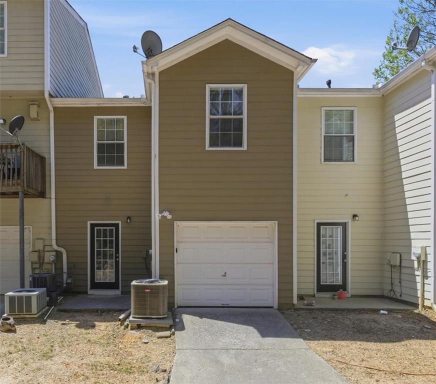 200 Riverstone Commons Circle Canton, GA 30114 - Photo 27 of 28 a front view of a house