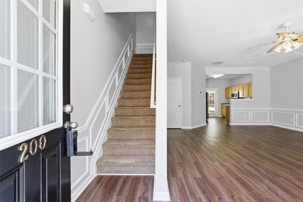 200 Riverstone Commons Circle Canton, GA 30114 - Photo 4 of 28 a view of an entryway with wooden floor
