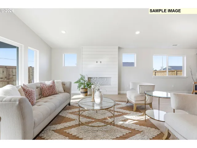 a living room with furniture and a couch