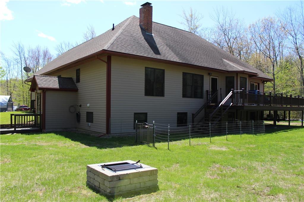 611 Borough Road Chesterville, ME 04938 - Photo 3 of 35 Fire pit with cooking grates. Level...