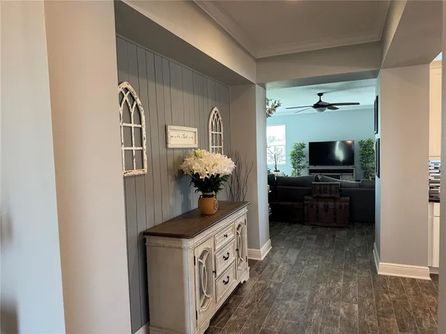 a kitchen with a sink and a stove top oven