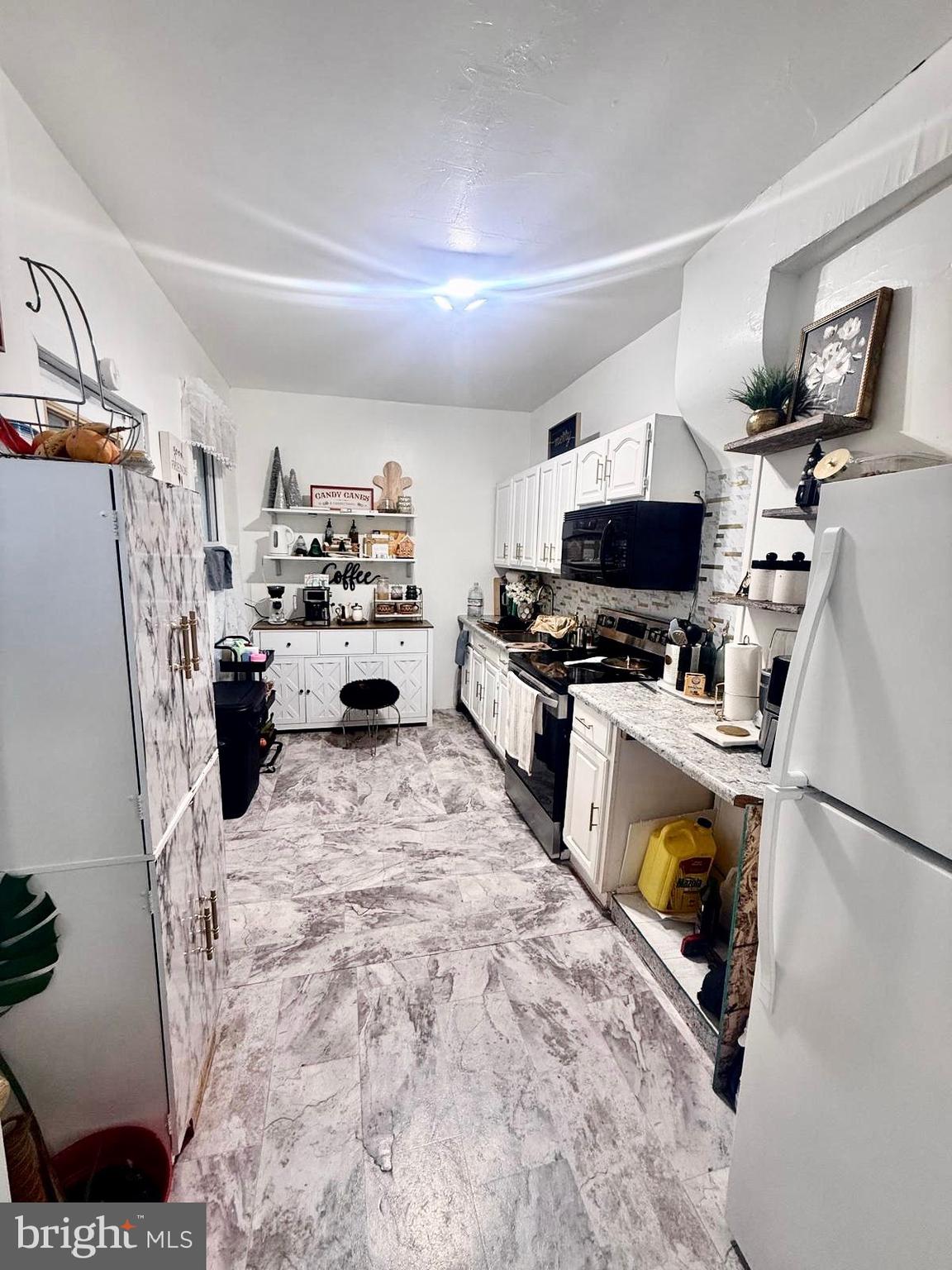 355 McKnight Street Reading, PA 19601 - Photo 12 of 70 a kitchen with sink cabinets and appliances