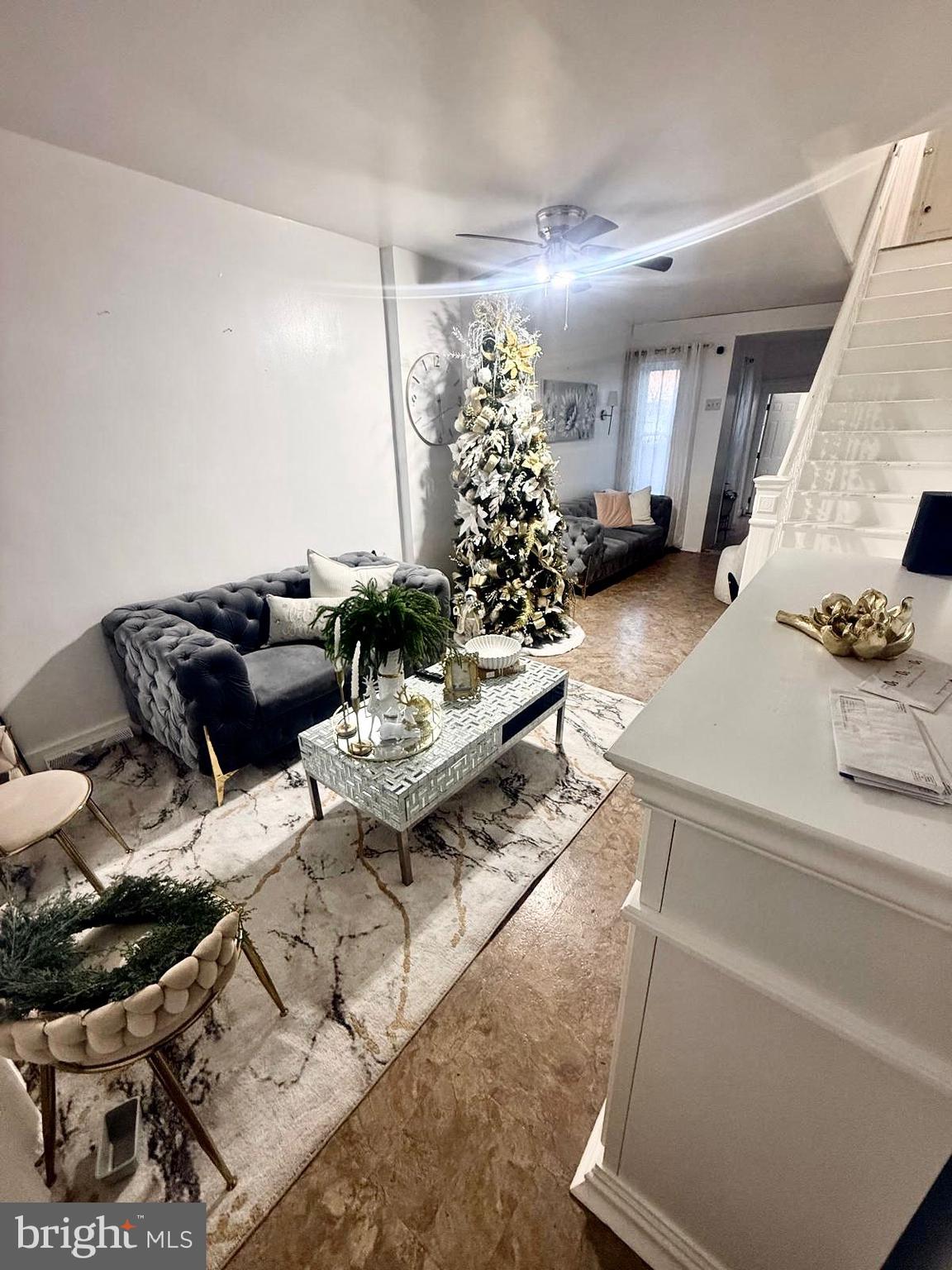 355 McKnight Street Reading, PA 19601 - Photo 19 of 70 a living room with furniture and flowers