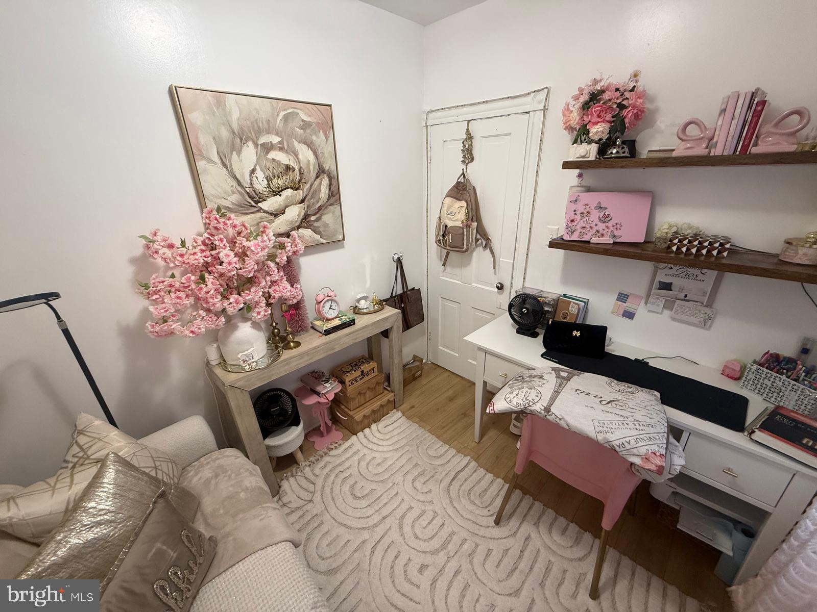 355 McKnight Street Reading, PA 19601 - Photo 27 of 70 a living room with furniture and painting on the wall