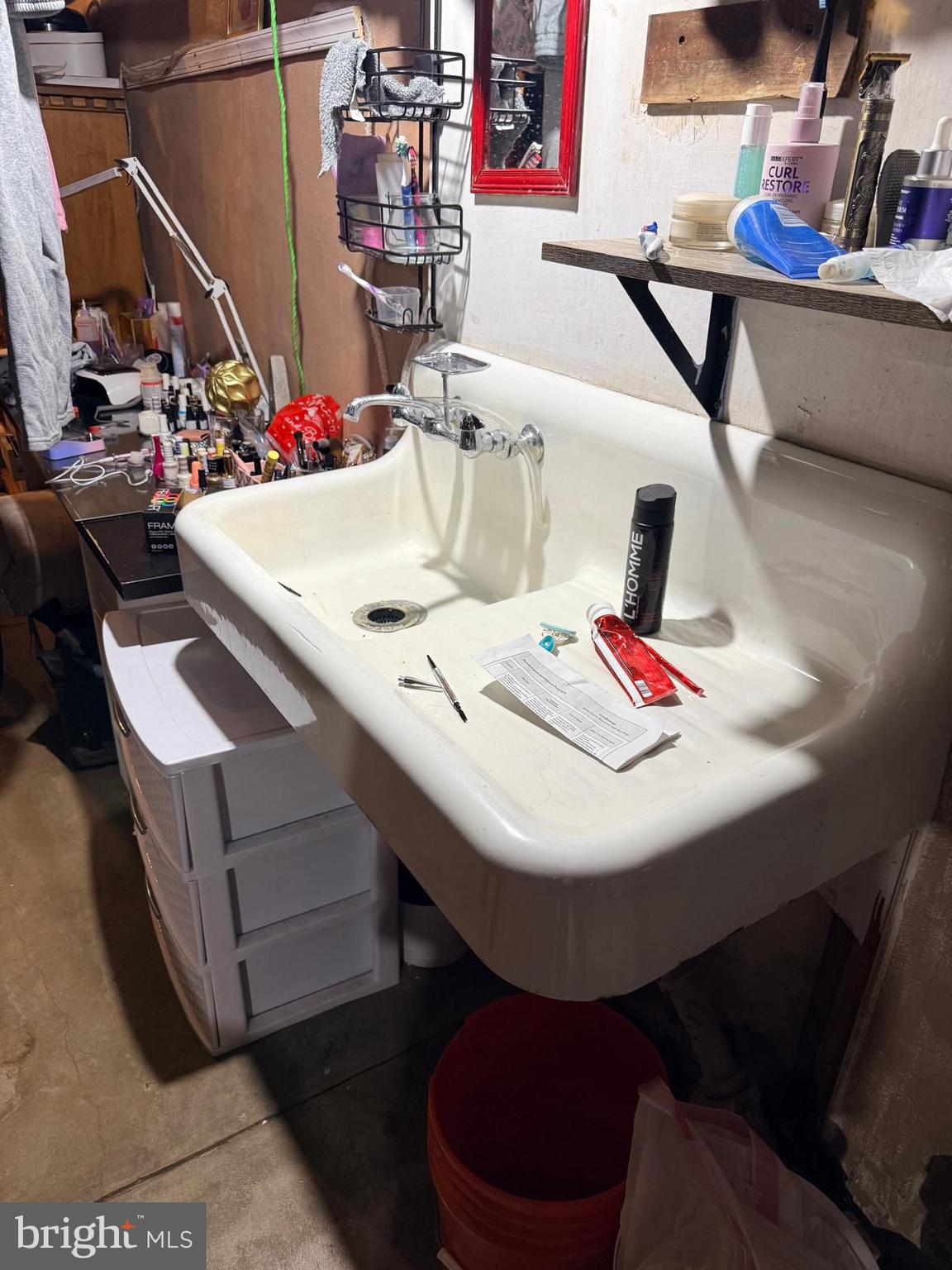 355 McKnight Street Reading, PA 19601 - Photo 54 of 70 a bathroom with a sink and a mirror
