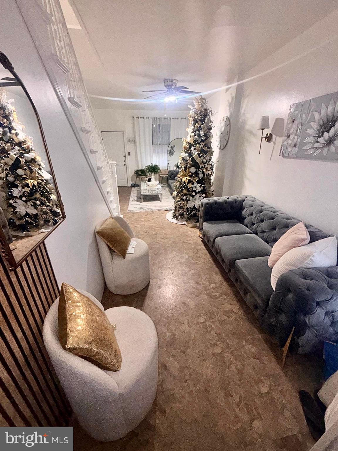 355 McKnight Street Reading, PA 19601 - Photo 10 of 70 a living room with furniture and flowers