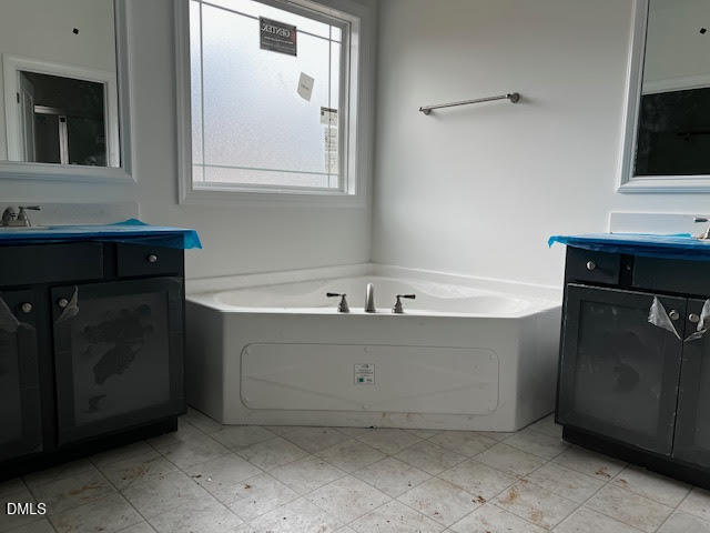 15 Alex Acres Way Selma, NC 27576 - Photo 7 of 11 a bathroom with a sink and a mirror