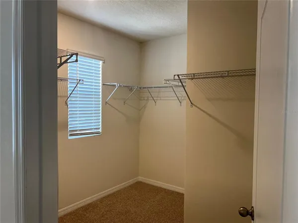 a view of a room with racks on the wall