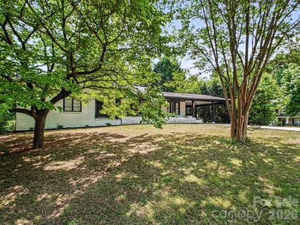 a house with trees in front of it