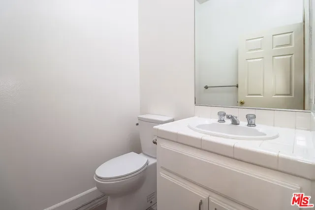 a bathroom with a sink a toilet and a bathtub