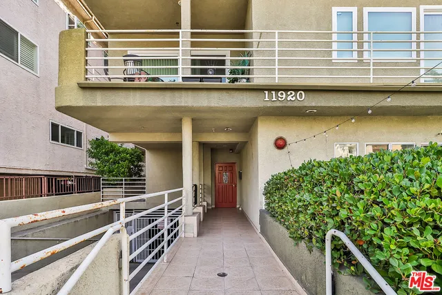 a view of a balcony with a large window