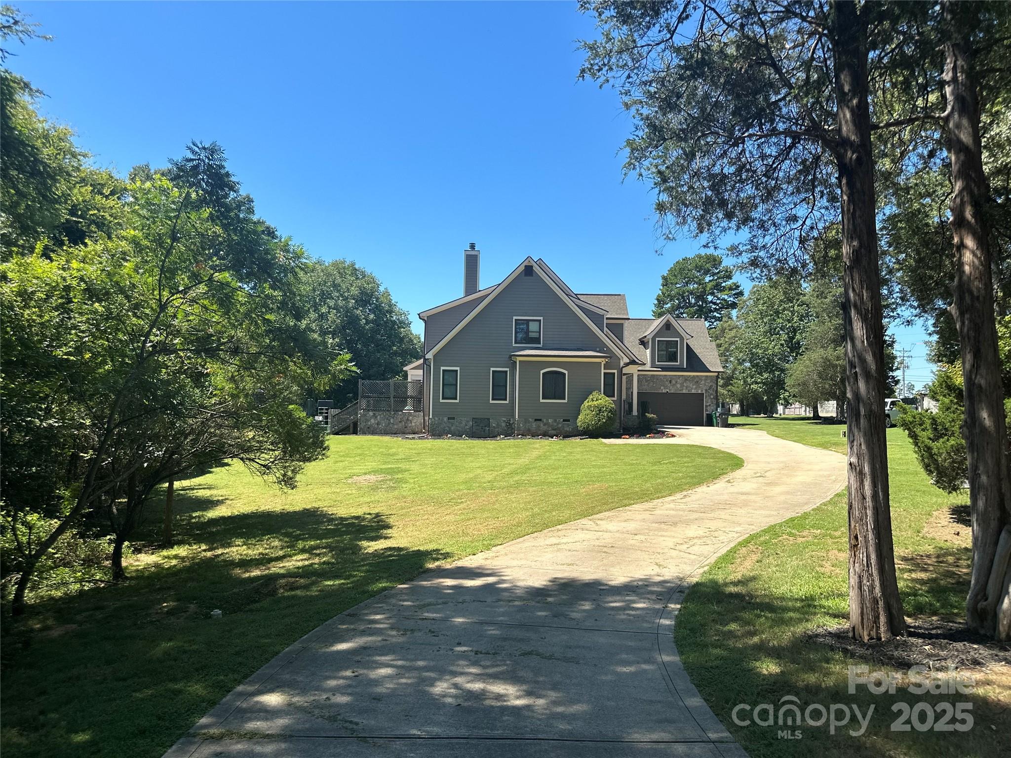 1132 Mt Holly-Huntersville Road Charlotte, NC 28214 - Photo 2 of 43 a front view of house with yard and green space