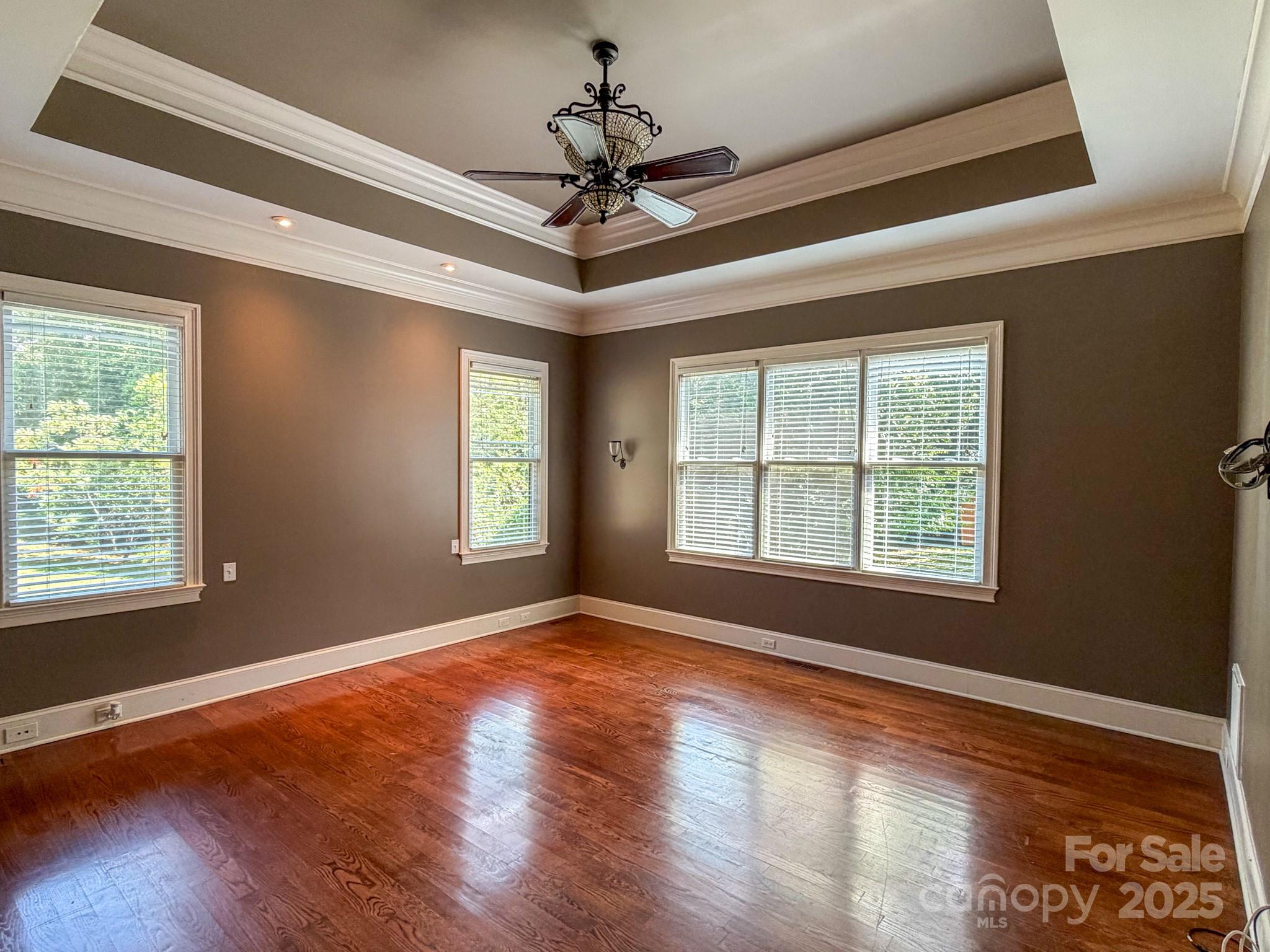 1132 Mt Holly-Huntersville Road Charlotte, NC 28214 - Photo 25 of 43 a view of an empty room with wooden floor and a window