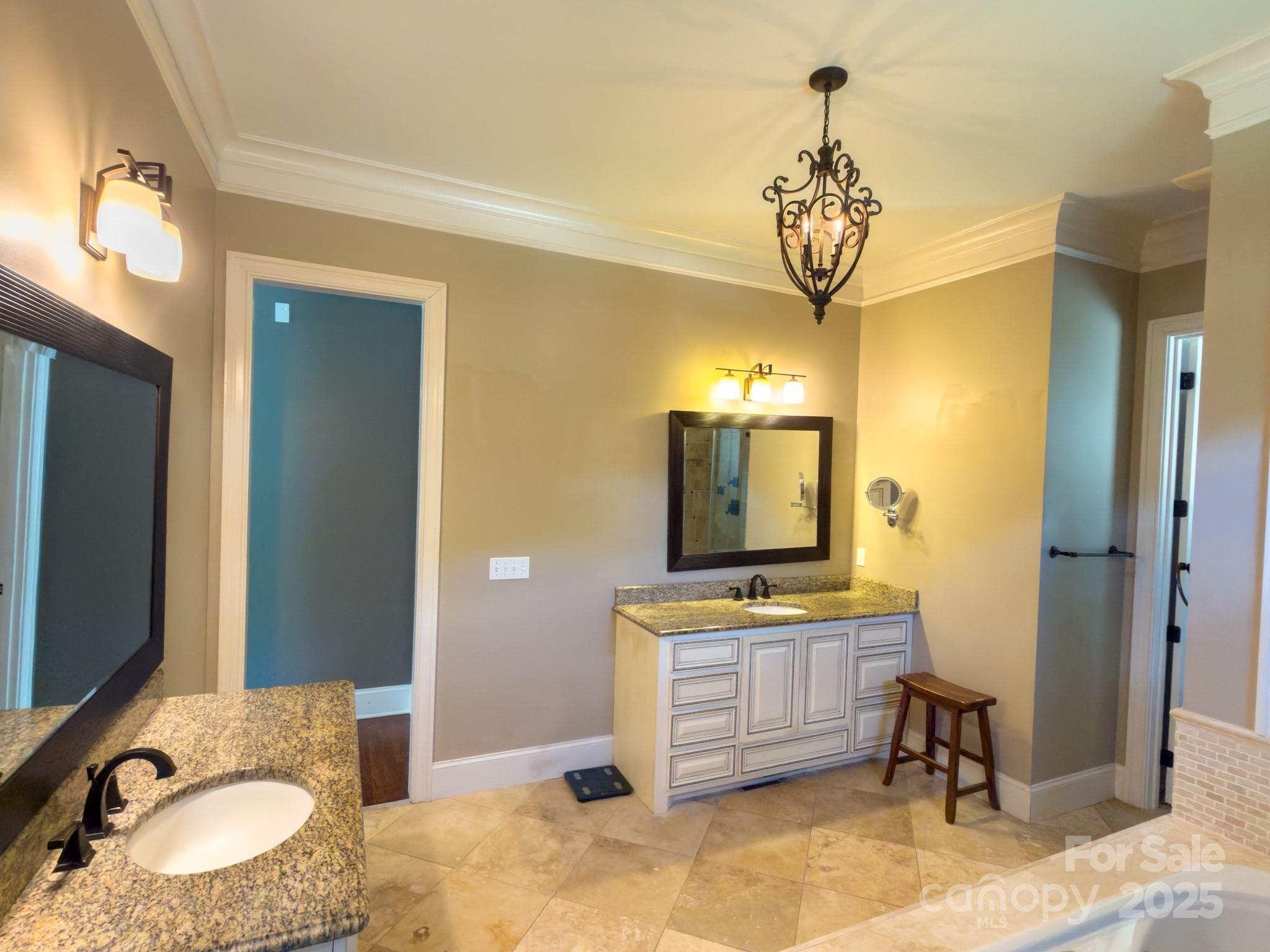 1132 Mt Holly-Huntersville Road Charlotte, NC 28214 - Photo 27 of 43 a bathroom with a granite countertop sink mirror and vanity