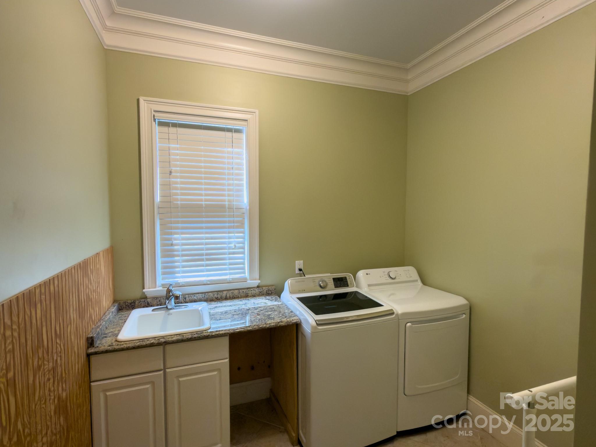 1132 Mt Holly-Huntersville Road Charlotte, NC 28214 - Photo 30 of 43 a utility room with dryer and washer