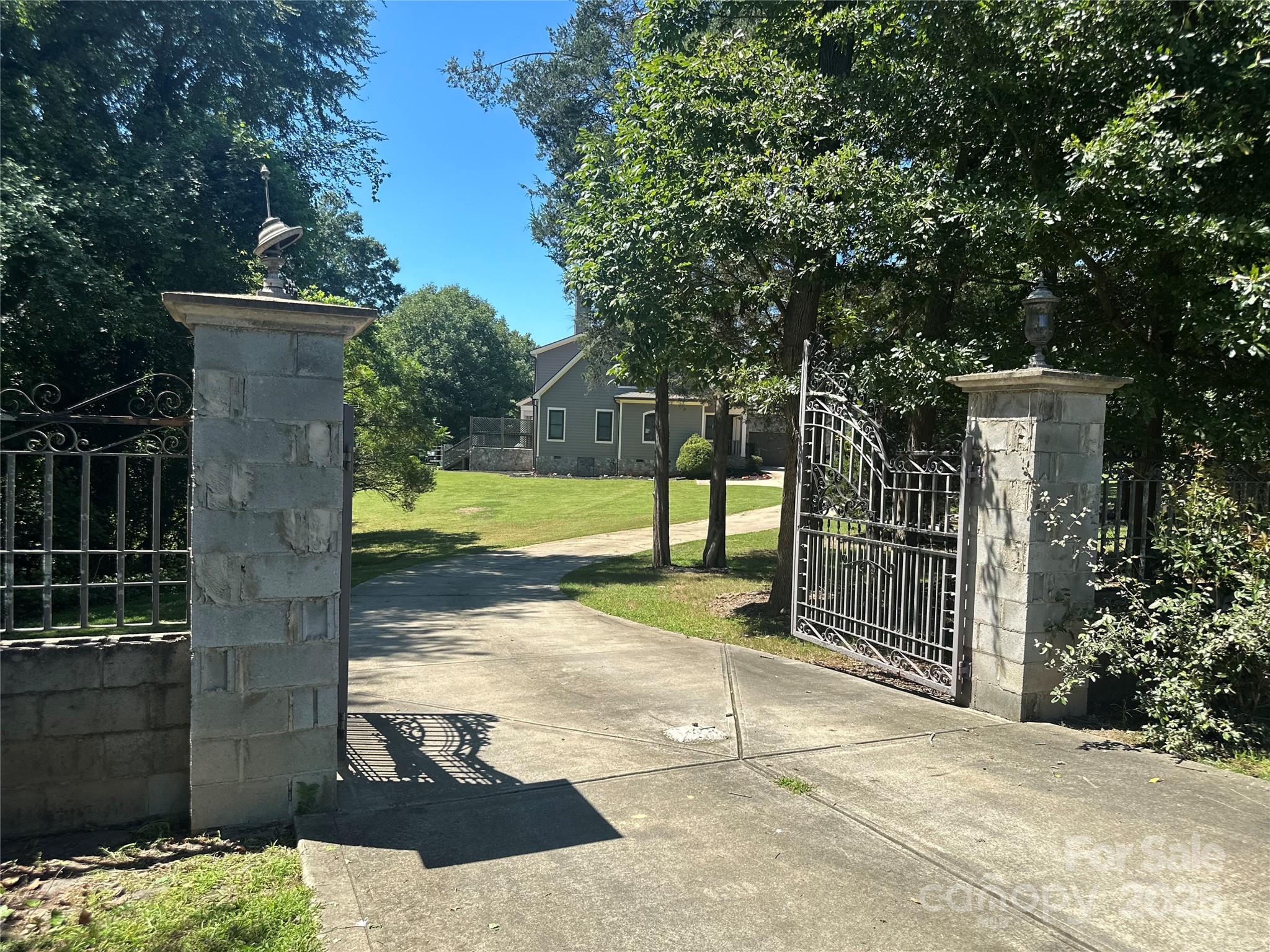 1132 Mt Holly-Huntersville Road Charlotte, NC 28214 - Photo 3 of 43 a view of a park with pathway