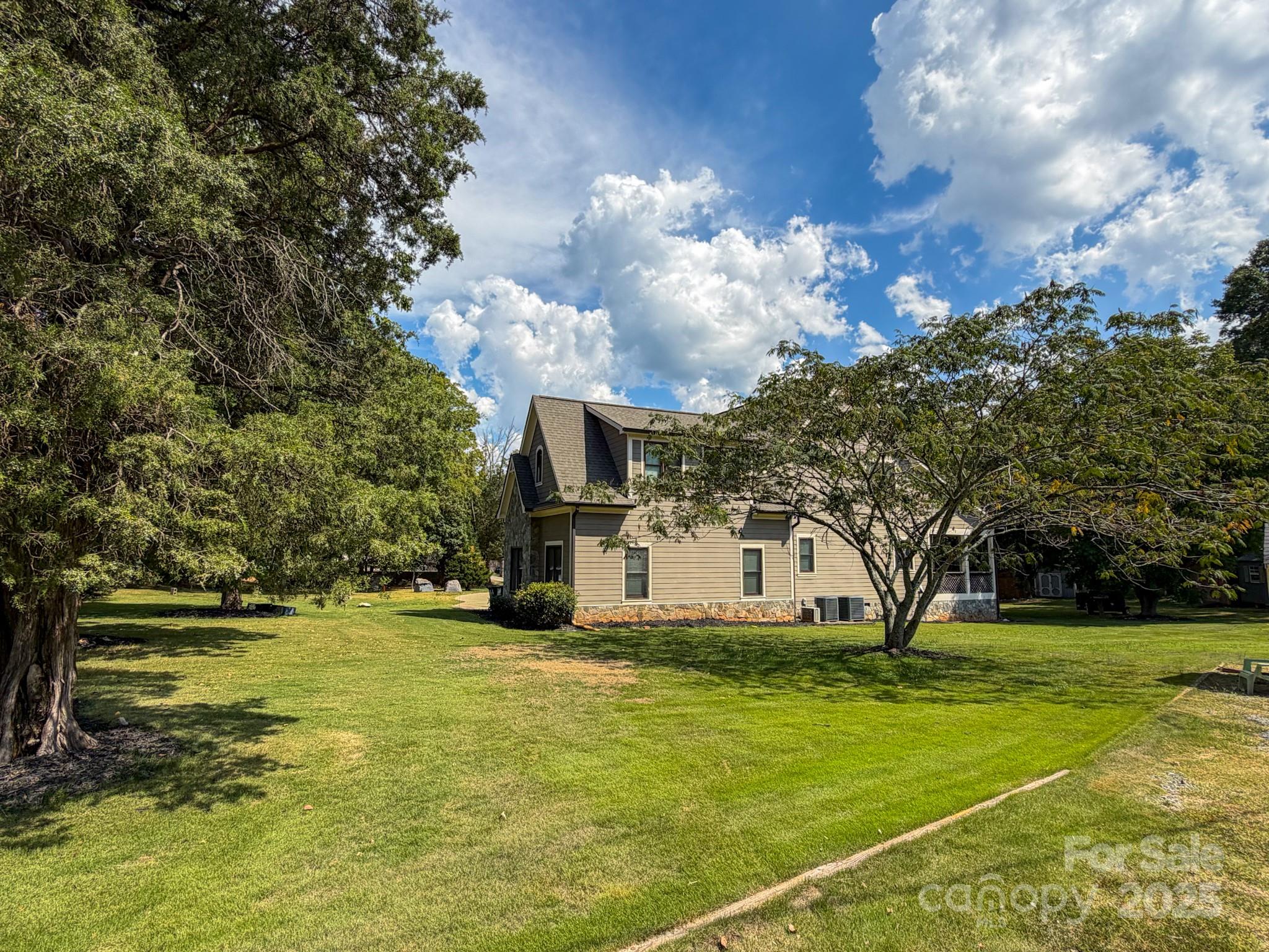 1132 Mt Holly-Huntersville Road Charlotte, NC 28214 - Photo 37 of 43 a view of a park with large trees