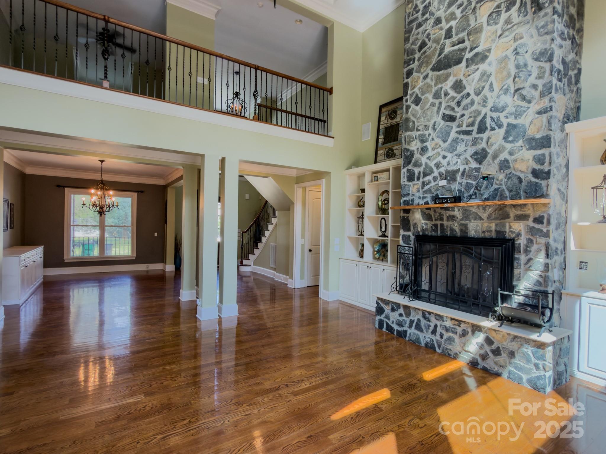 1132 Mt Holly-Huntersville Road Charlotte, NC 28214 - Photo 5 of 43 a view of a living room with furniture and a fireplace