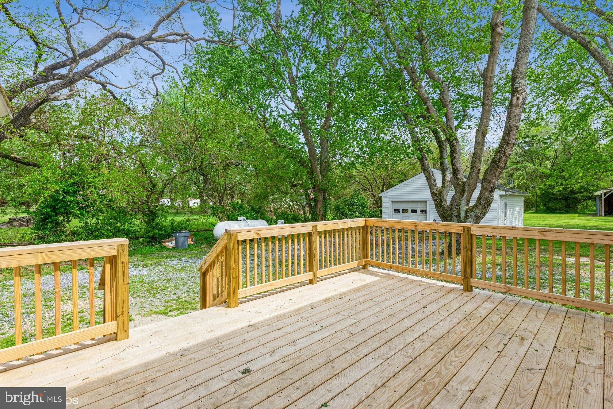 28149 Nanticoke Road Salisbury, MD 21801 - Photo 4 of 37 Deck view of backyard and garage