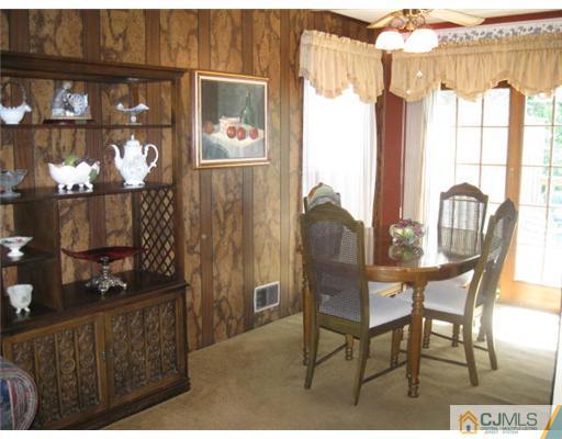 196 North Hill Road Colonia, NJ 07067 - Photo 6 of 10 a view of a chairs and table in a balcony
