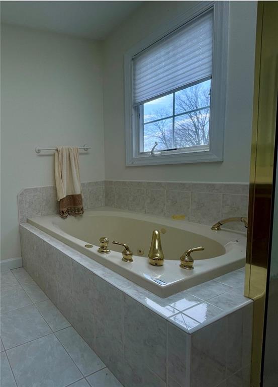 1849 Dutch Ridge Road Ellwood City, PA 16117 - Photo 11 of 17 a bathroom with a tub