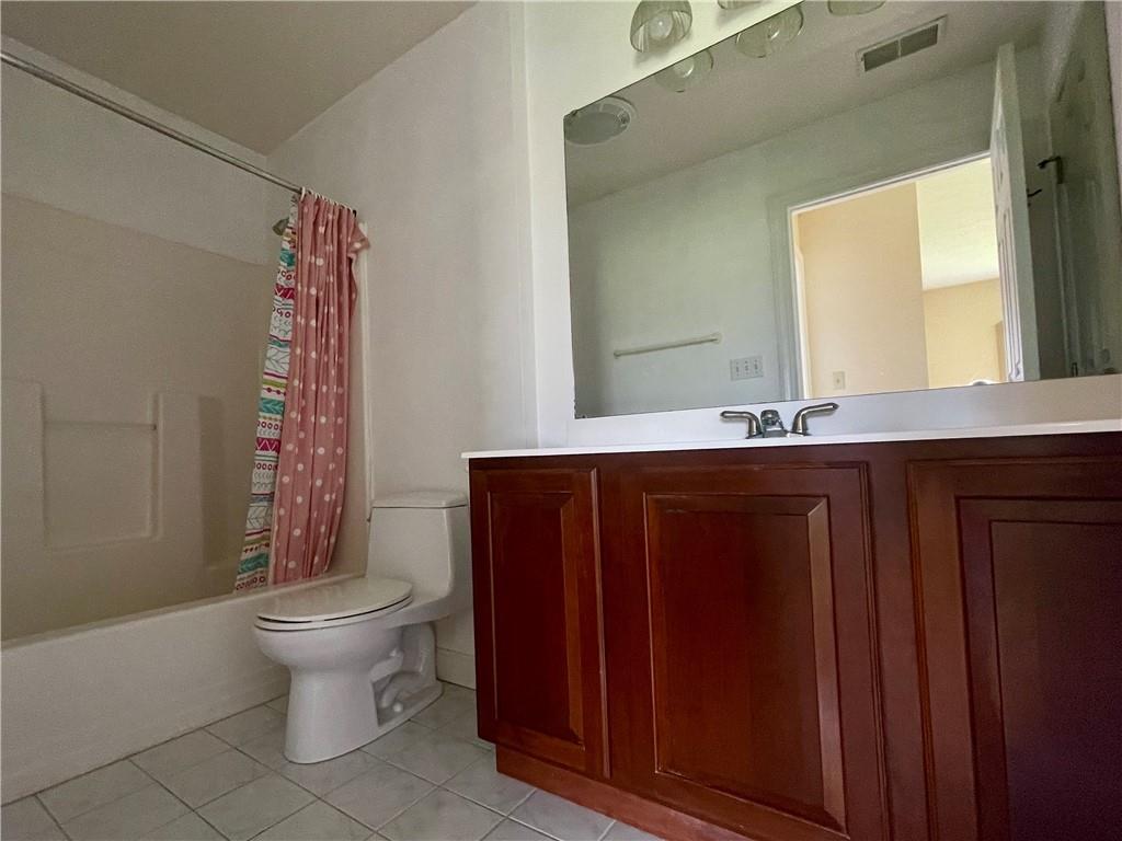 1849 Dutch Ridge Road Ellwood City, PA 16117 - Photo 13 of 17 a bathroom with a sink a toilet and shower