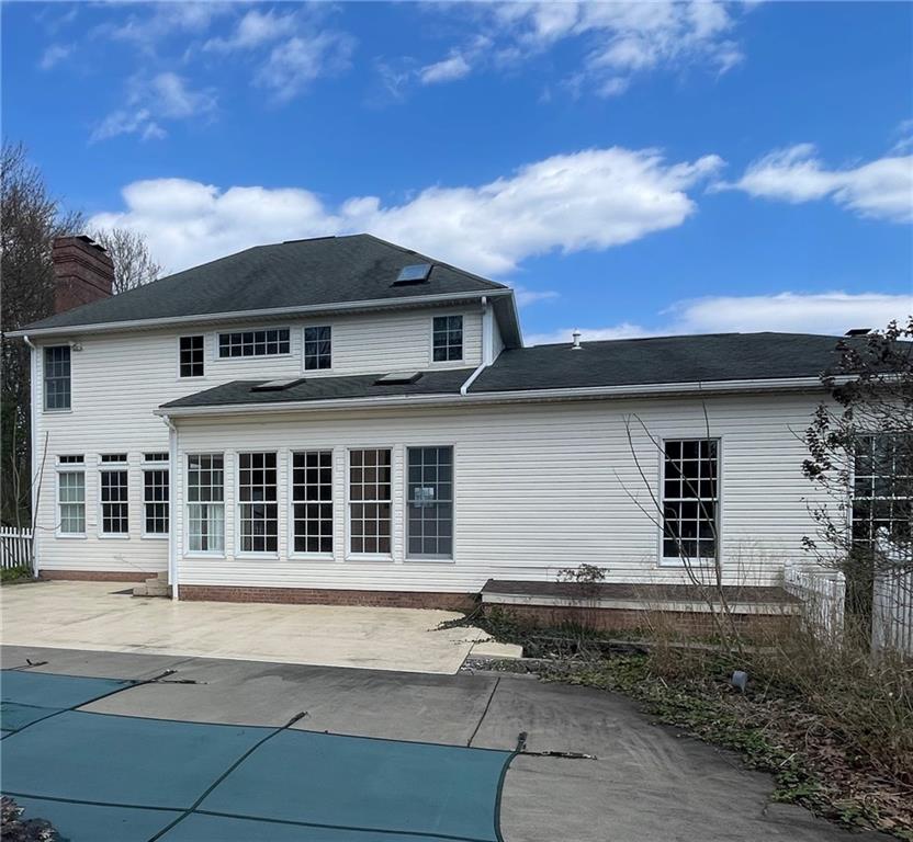 1849 Dutch Ridge Road Ellwood City, PA 16117 - Photo 17 of 17 a front view of a house with a yard