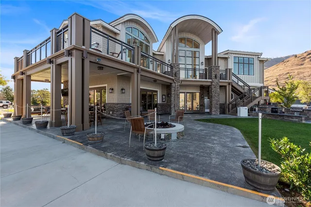 an aerial view of a house with a lake view