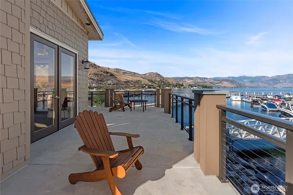 a view of a house with a yard porch and sitting area