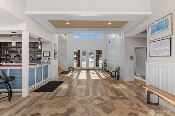 a kitchen with stainless steel appliances granite countertop a refrigerator and microwave
