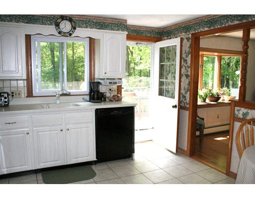 35 Colonial Drive Reading, MA 01867 - Photo 5 of 14 a kitchen with a sink cabinets and a large window