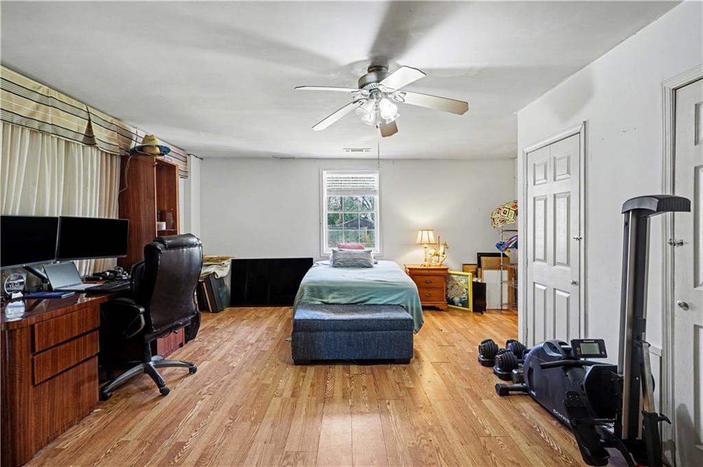 267 Macon Street Monticello, GA 31064 - Photo 24 of 28 a living room with furniture and a flat screen tv