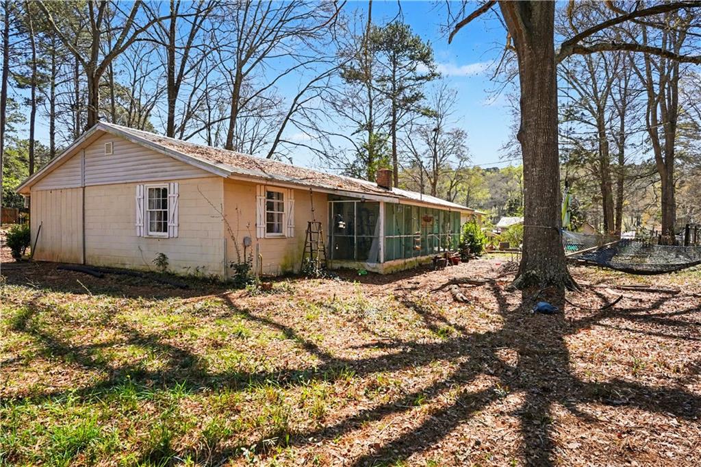 267 Macon Street Monticello, GA 31064 - Photo 27 of 28 a view of a house with a yard covered in snow