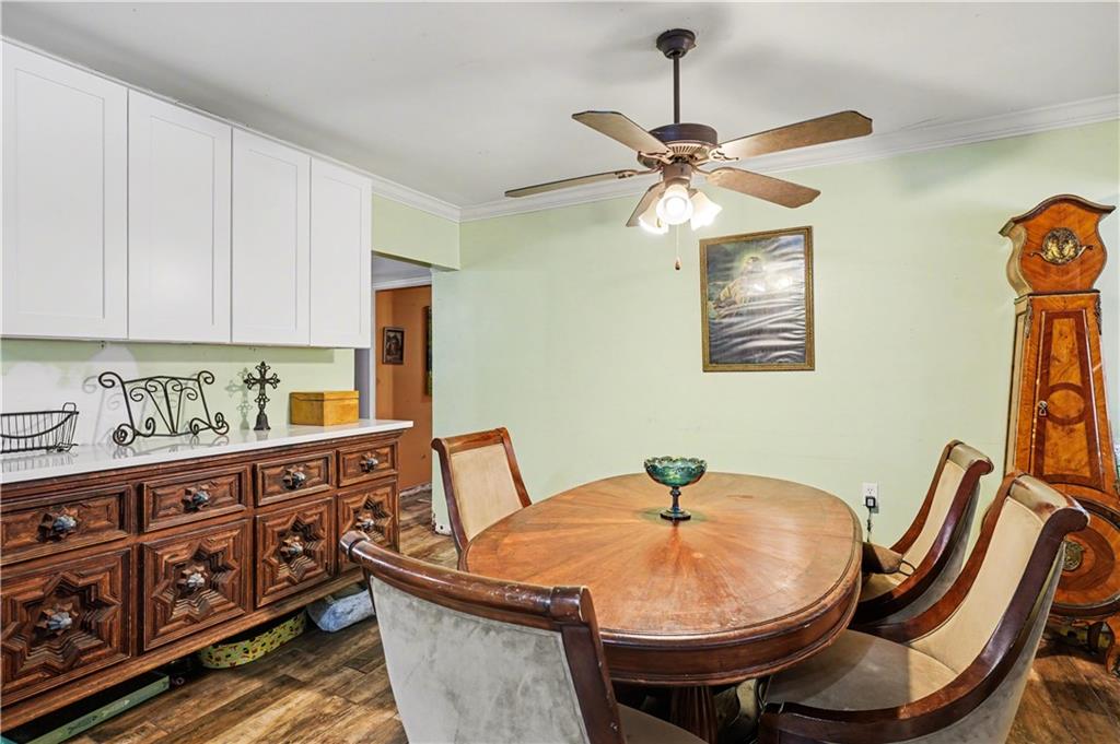 267 Macon Street Monticello, GA 31064 - Photo 10 of 28 a dining room with furniture and window