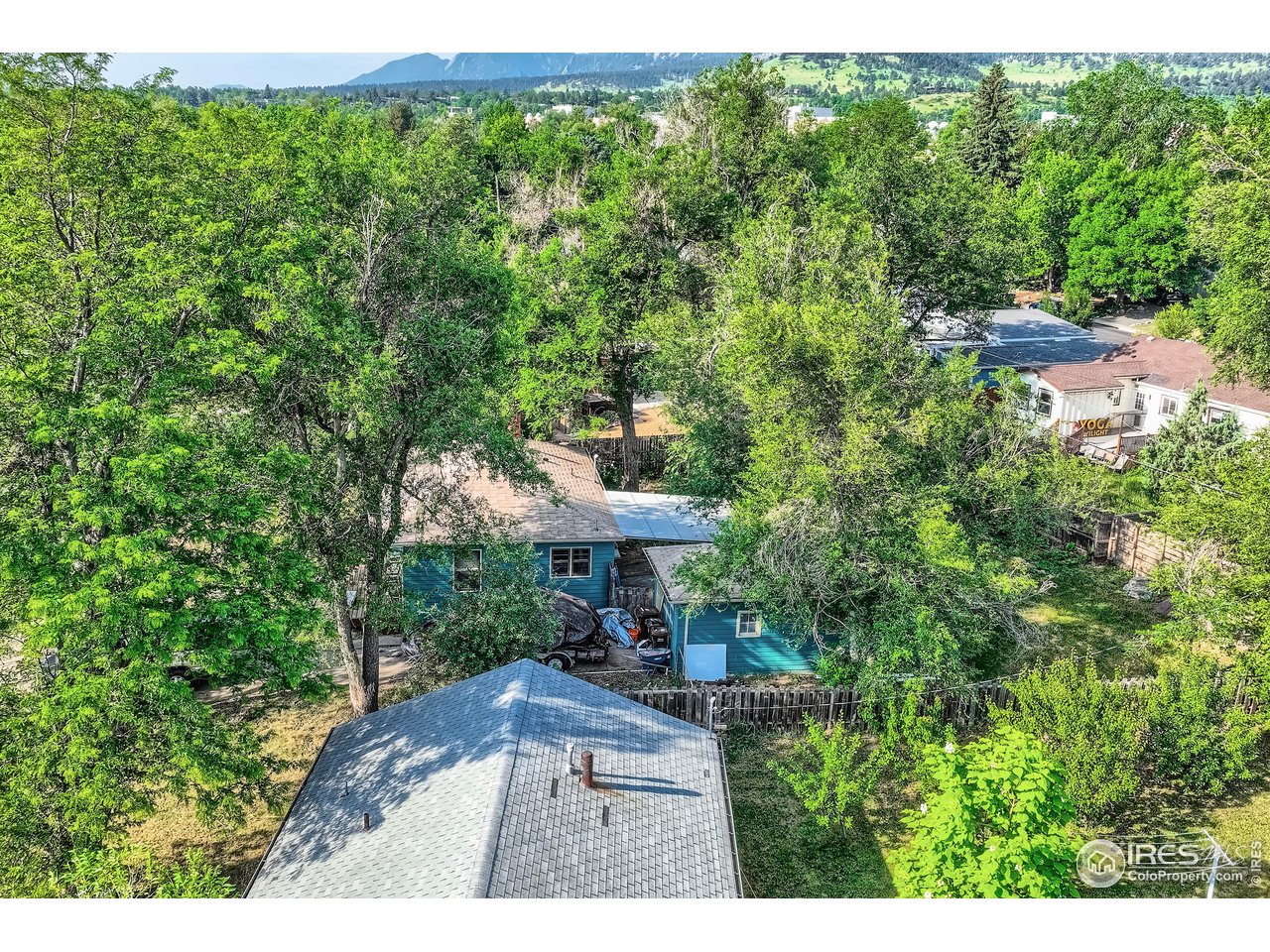 315 29th Street Boulder, CO 80305 - Photo 23 of 29 a view of a back yard from a bench