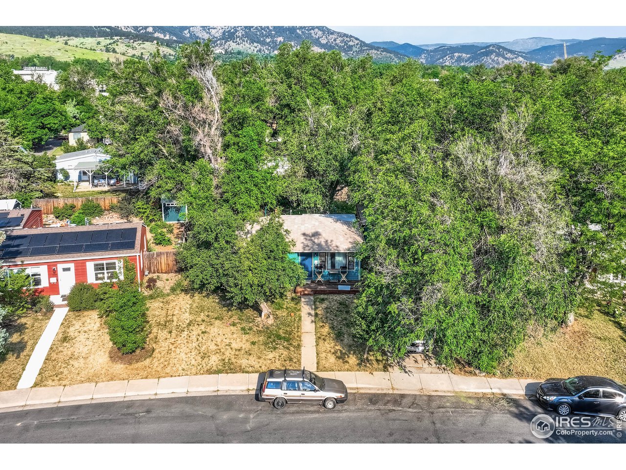 315 29th Street Boulder, CO 80305 - Photo 24 of 29 a view of a yard and front view of a house