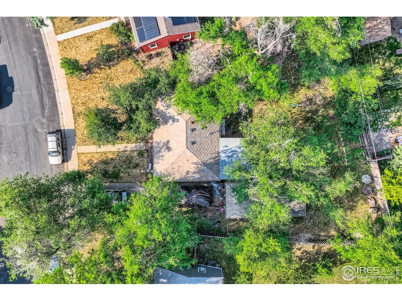 315 29th Street Boulder, CO 80305 - Photo 27 of 29 an aerial view of a house with a yard and garden