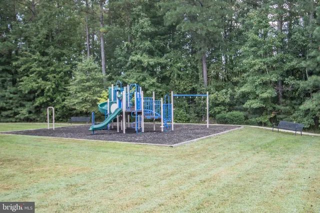 a view of a patio with couches table and chairs