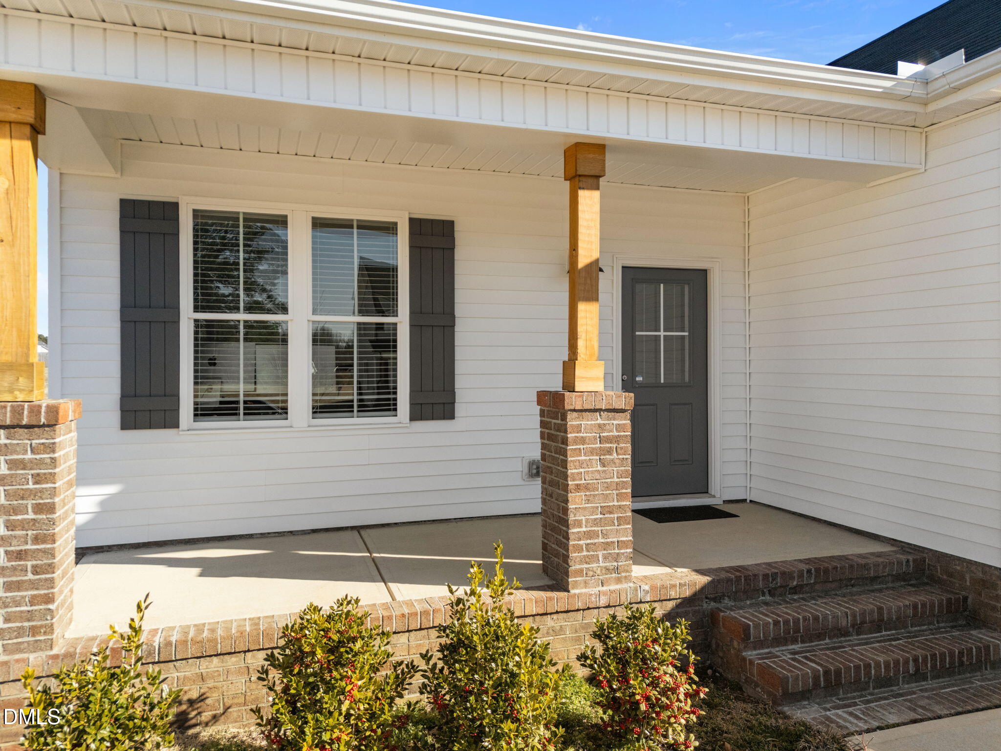 295 Springtooth Drive Zebulon, NC 27597 - Photo 4 of 36 3-web-or-mls-DJI_20260209094407_0684_D