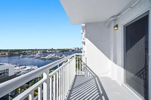 a view of a balcony with wooden floor