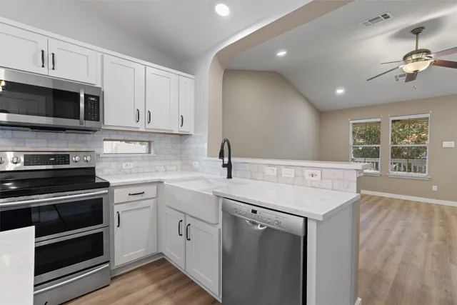 a living room with chairs