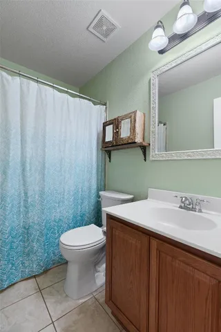 a view of a backyard with a patio